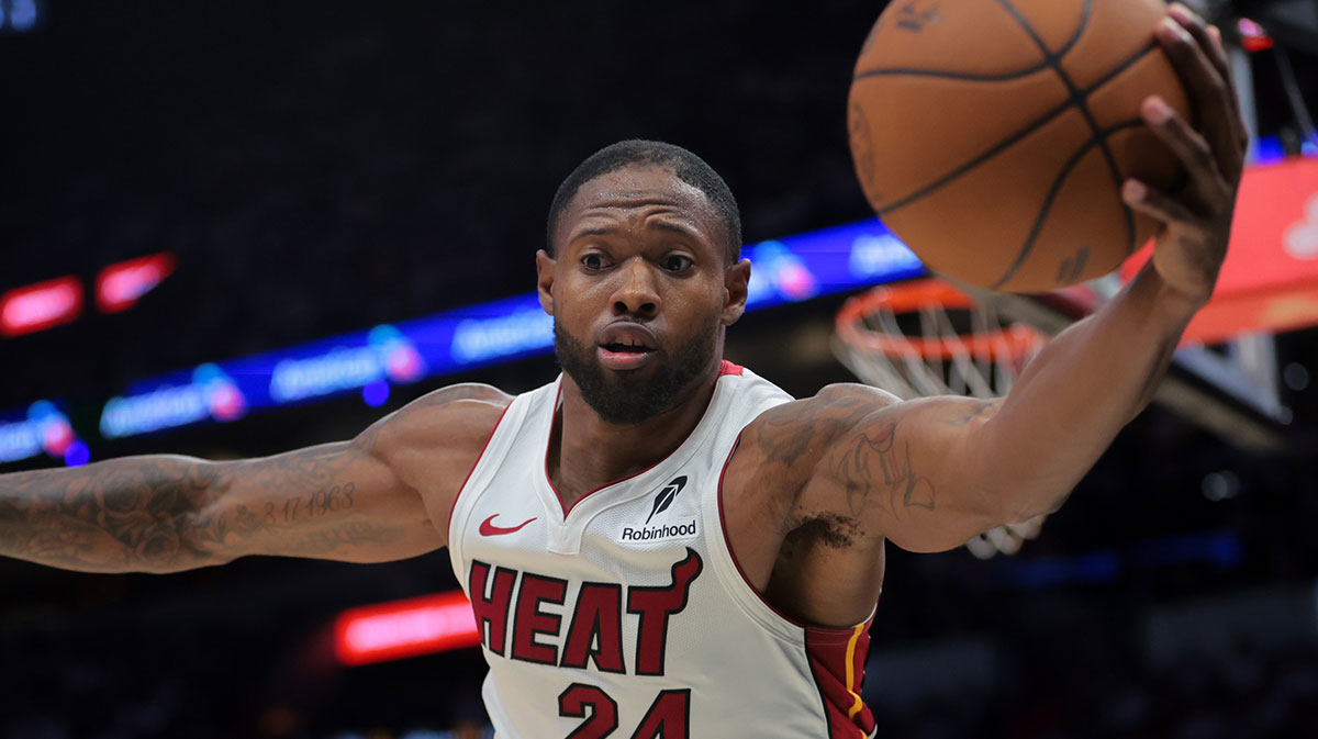 Miami Heat forward Haywood Highsmith (24) reaches for the basketball to prevent it from going out of bounds against the Cleveland Cavaliers in the second quarter during game four for the first round of the 2025 NBA Playoffs at Kaseya Center. Nets