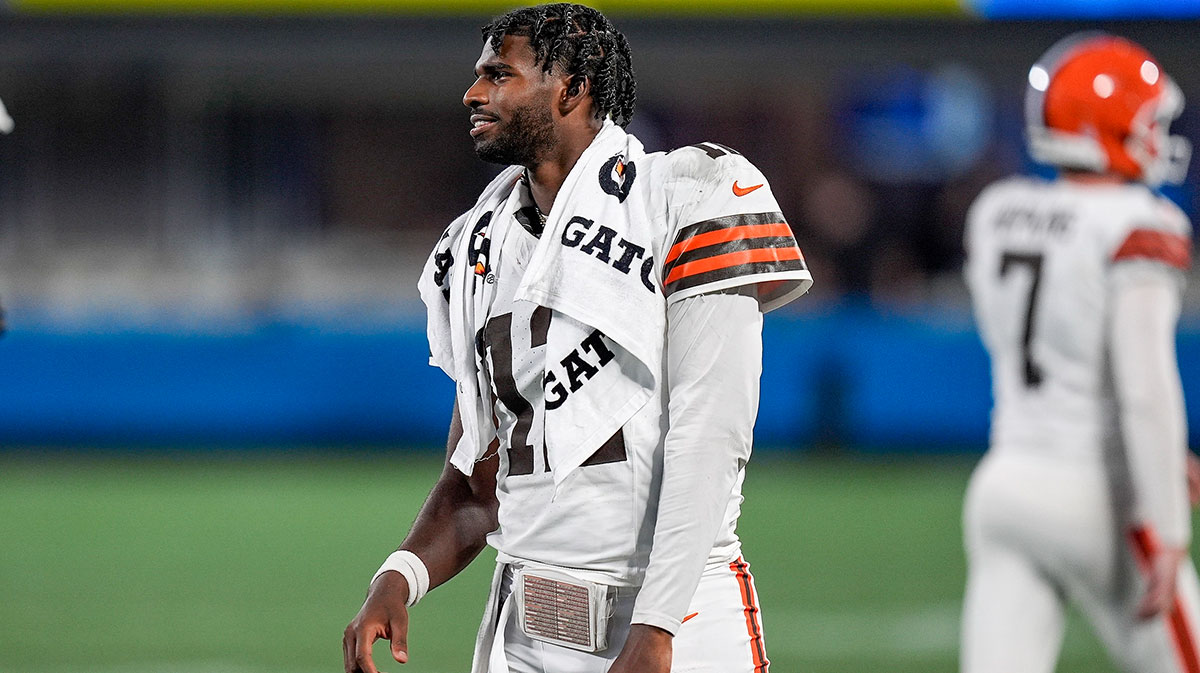 Browns quarterback Shedeur Sanders (12) greets teammates coming off the field after a touchdown drive against the Carolina Panthers during the second half at Bank of America Stadium