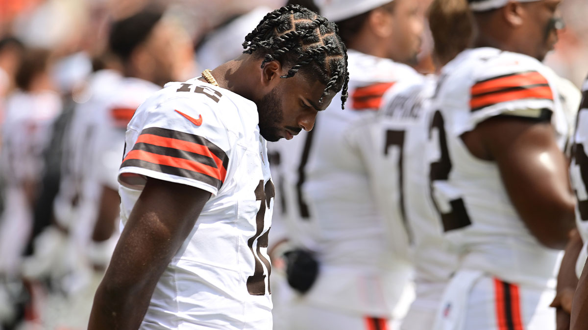 Browns quarterback Shedeur Sanders (12) listens to the national anthem before the game between the Browns and the Los Angeles Rams at Huntington Bank Field