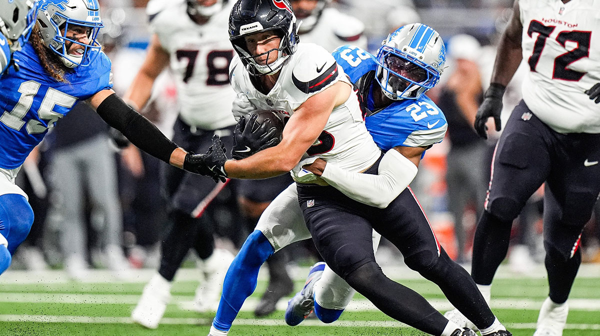 Detroit Lions cornerback Rock Ya-Sin (23) tackles Houston Texans tight end Harrison Bryant (88) during the first half at Ford Field in Detroit on Saturday, August 23, 2025.