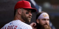 Philadelphia Phillies first base Bryce Harper (3) looks on in front of outfielder Brandon Marsh before taking the field for action against the Los Angeles Angels at Citizens Bank Park.