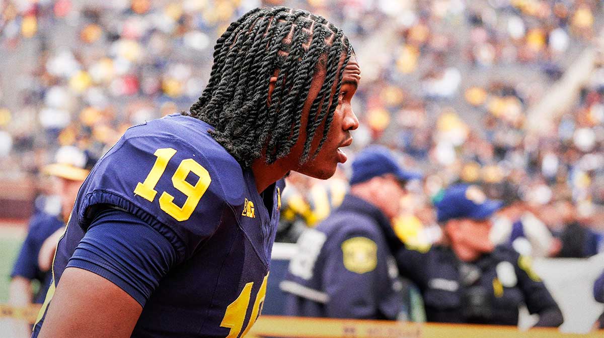 Michigan quarterback Bryce Underwood (19) walks up the tunnel after the first half of the spring game at Michigan Stadium