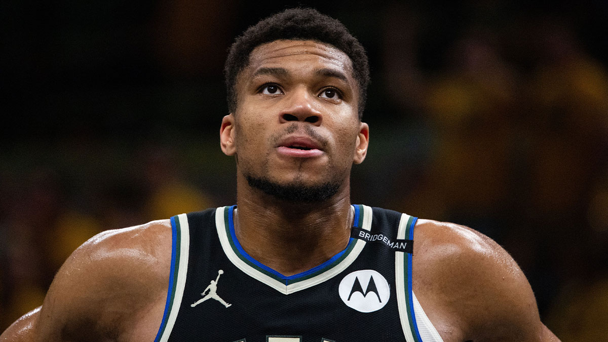 Bucks forward Giannis Antetokounmpo (34) during game five of the first round for the 2024 NBA Playoffs against the Indiana Pacers at Gainbridge Fieldhouse with ESPN's Shams Charania in the background