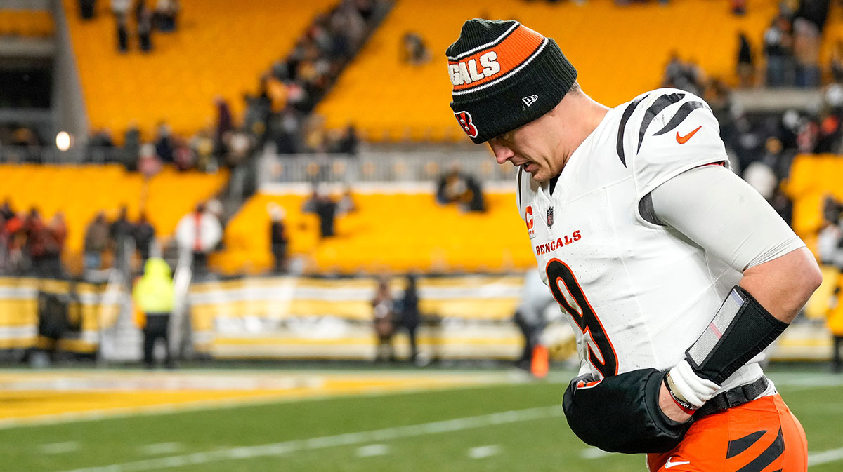 Cincinnati Bengals quarterback Joe Burrow (9) runs for the locker room after the fourth quarter of the NFL Week 18 game between the Pittsburgh Steelers and the Cincinnati Bengals at Acrisure Stadium in Pittsburgh on Saturday, Jan. 4, 2025. The Bengals won 19-17 to finish the regular season at 9-8.