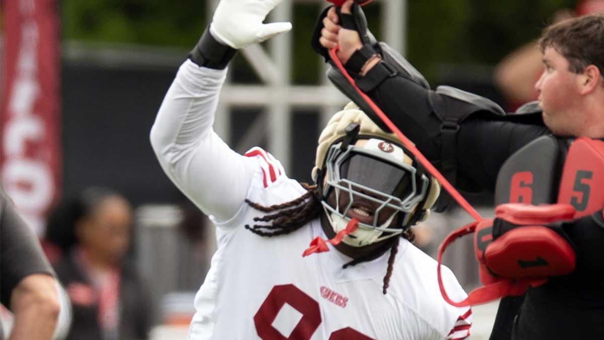 San Francisco 49ers defensive tackle CJ West (99) swats at a ball during a pass rushing drill on the second day of training camp.
