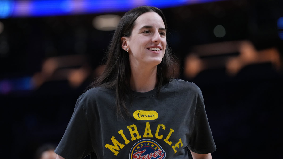 Indiana Fever guard Caitlin Clark (22) smiles during pregame warmups against the LA Sparks at Crypto.com Arena.
