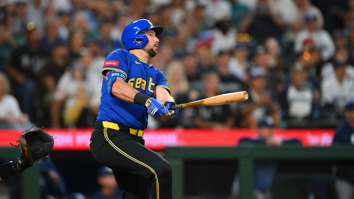 Seattle Mariners catcher Cal Raleigh (29) hits 3-run home run against the Tampa Bay Rays during the eighth inning at T-Mobile Park.