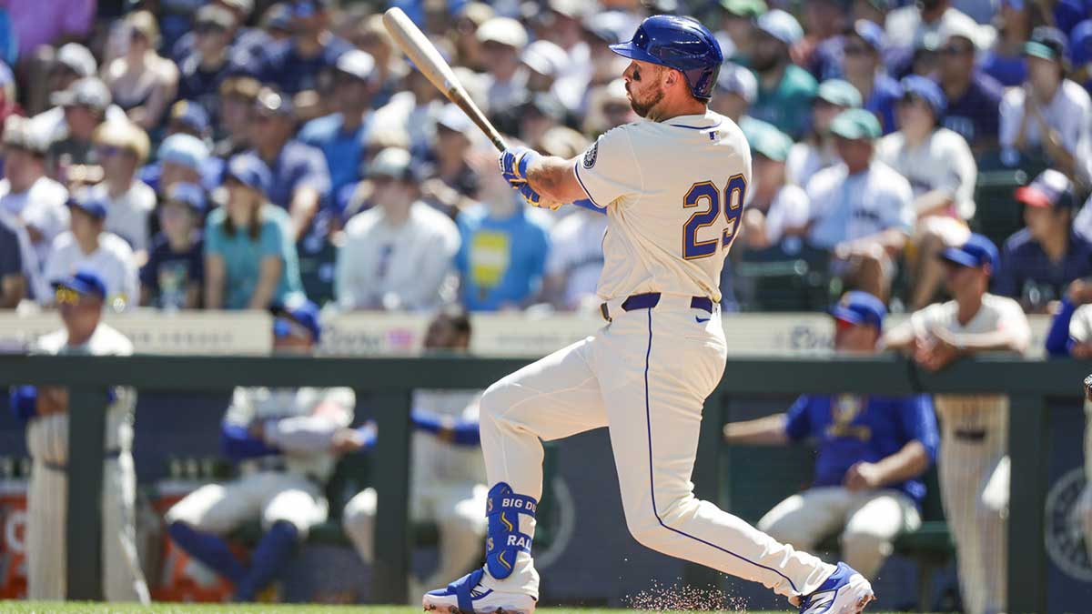 Seattle Mariners designated hitter Cal Raleigh (29) hits a two-run home run against the Tampa Bay Rays during the first inning at T-Mobile Park.