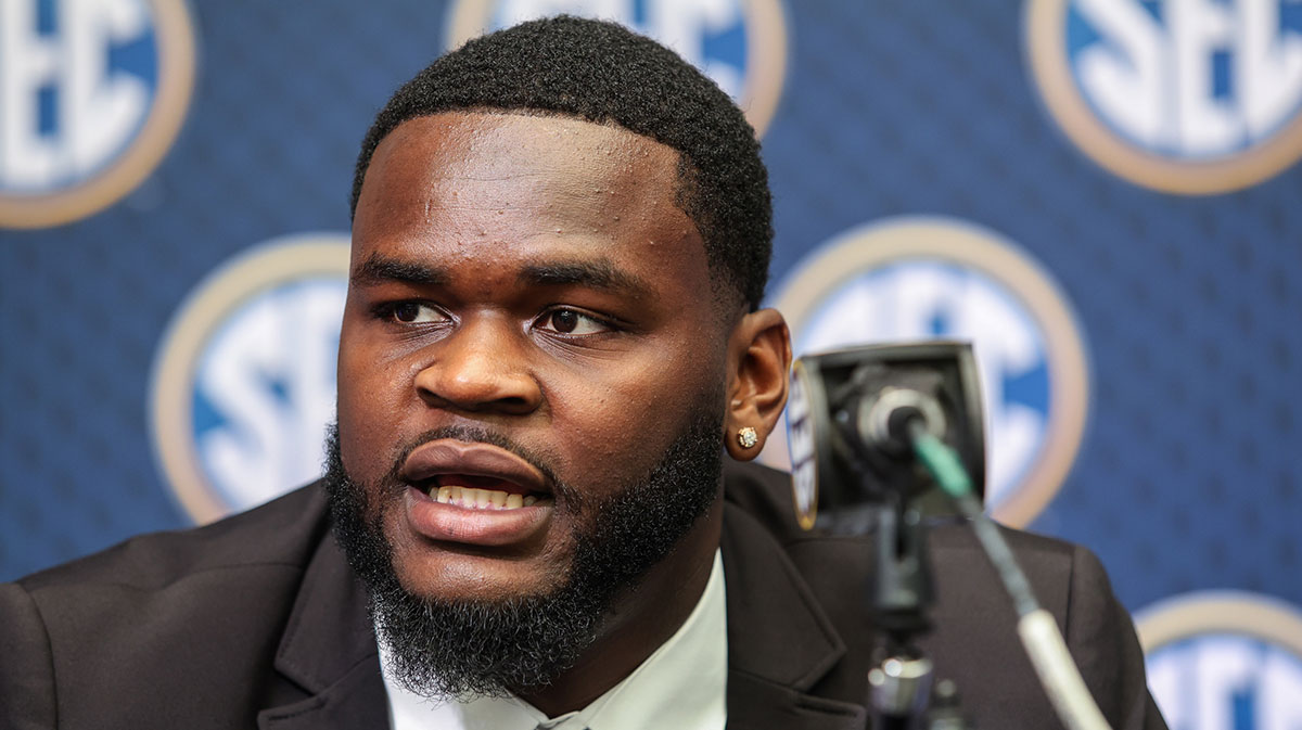Florida Gators defensive lineman Caleb Banks answers questions from the media during the SEC Media Days at Omni Atlanta Hotel.