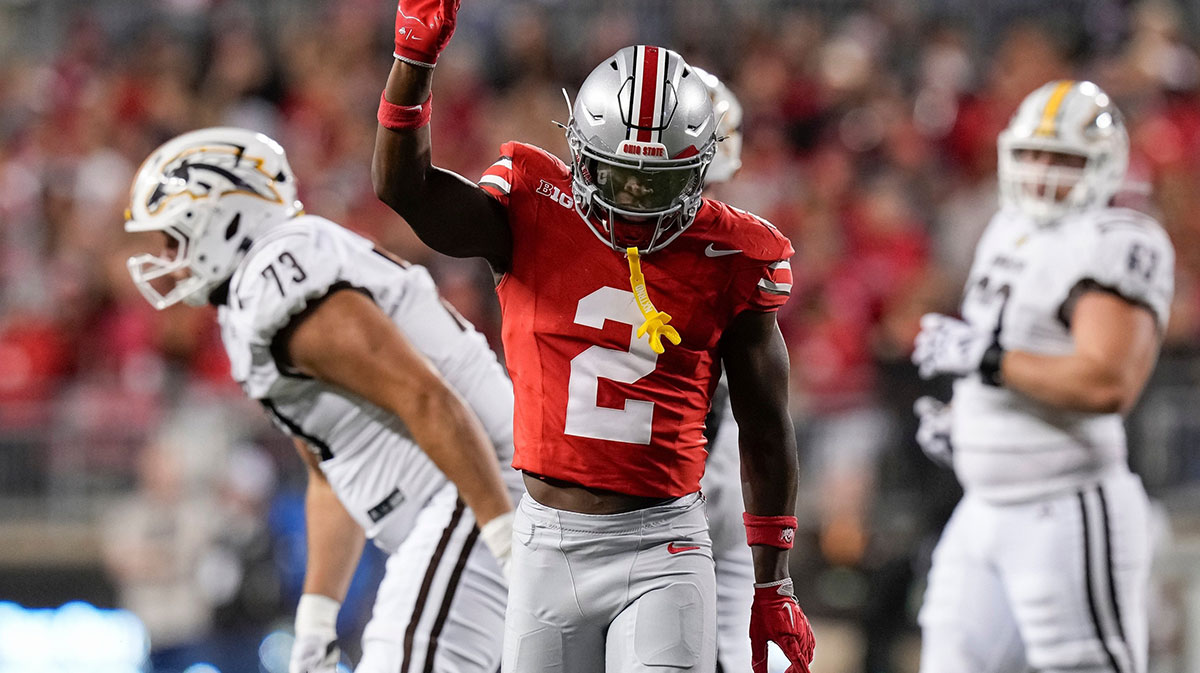 Ohio State safety Caleb Downs celebrates a play against Western Michigan.