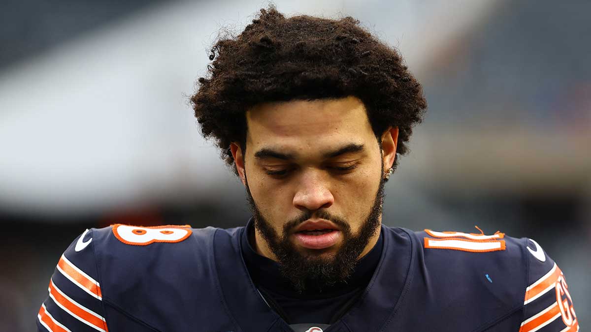 Chicago Bears quarterback Caleb Williams (18) walks off the field after the game against the Detroit Lions during the second half at Soldier Field.