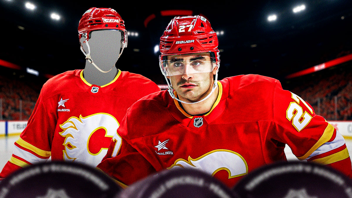 Matt Coronato in middle, one silhouetted Calgary Flames player on either side (no C or A on jersey), hockey rink in background