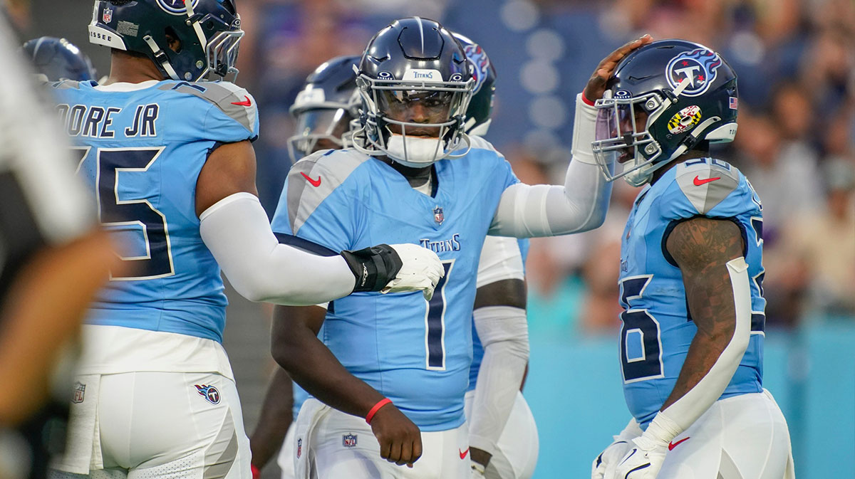 Tennessee Titans quarterback Cam Ward (1) gets into position for the first play of the pre-season game against the Minnesota Vikings at Nissan Stadium in Nashville, Tenn., Friday, Aug. 22, 2025.