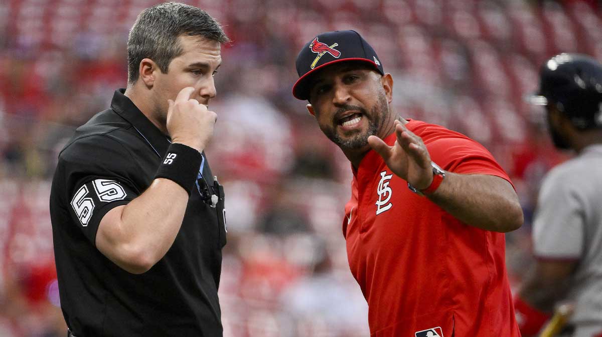 St. Louis Cardinals manager Oliver Marmol (37) argues with umpire Brennan Miller (55) after he was ejected from the game against the Atlanta Braves during the ninth inning at Busch Stadium.