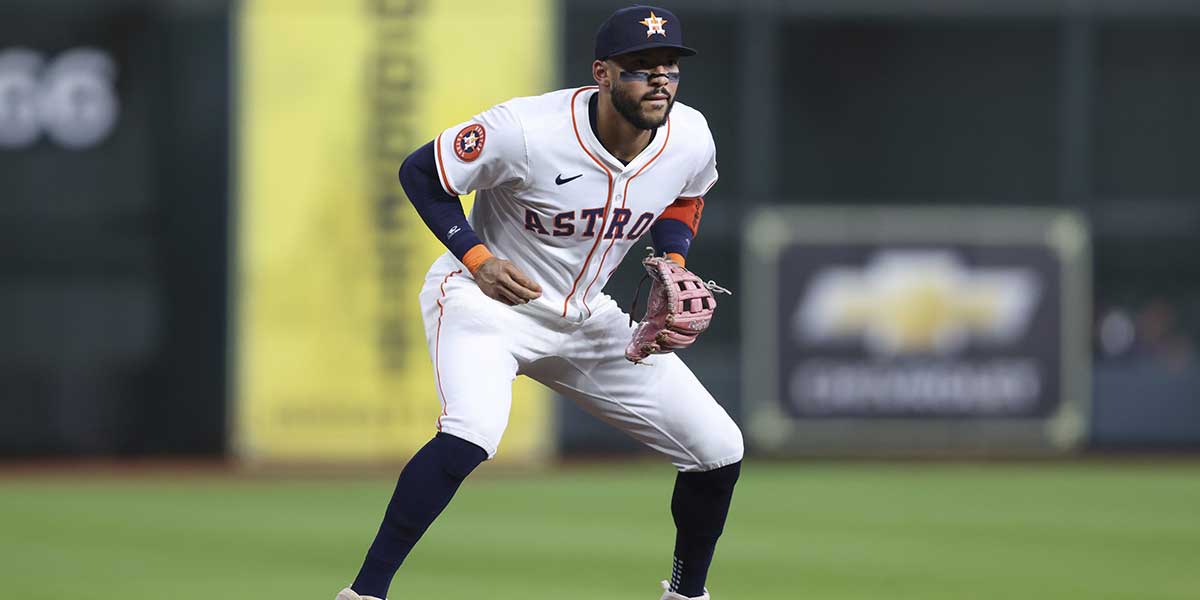 Houston Astros third baseman Carlos Correa (1) waits for a pitch during the game against the Boston Red Sox at Daikin Park.