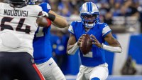Detroit Lions quarterback Hendon Hooker (2) looks to pass the ball against the Houston Texans during the second half at Ford Field.