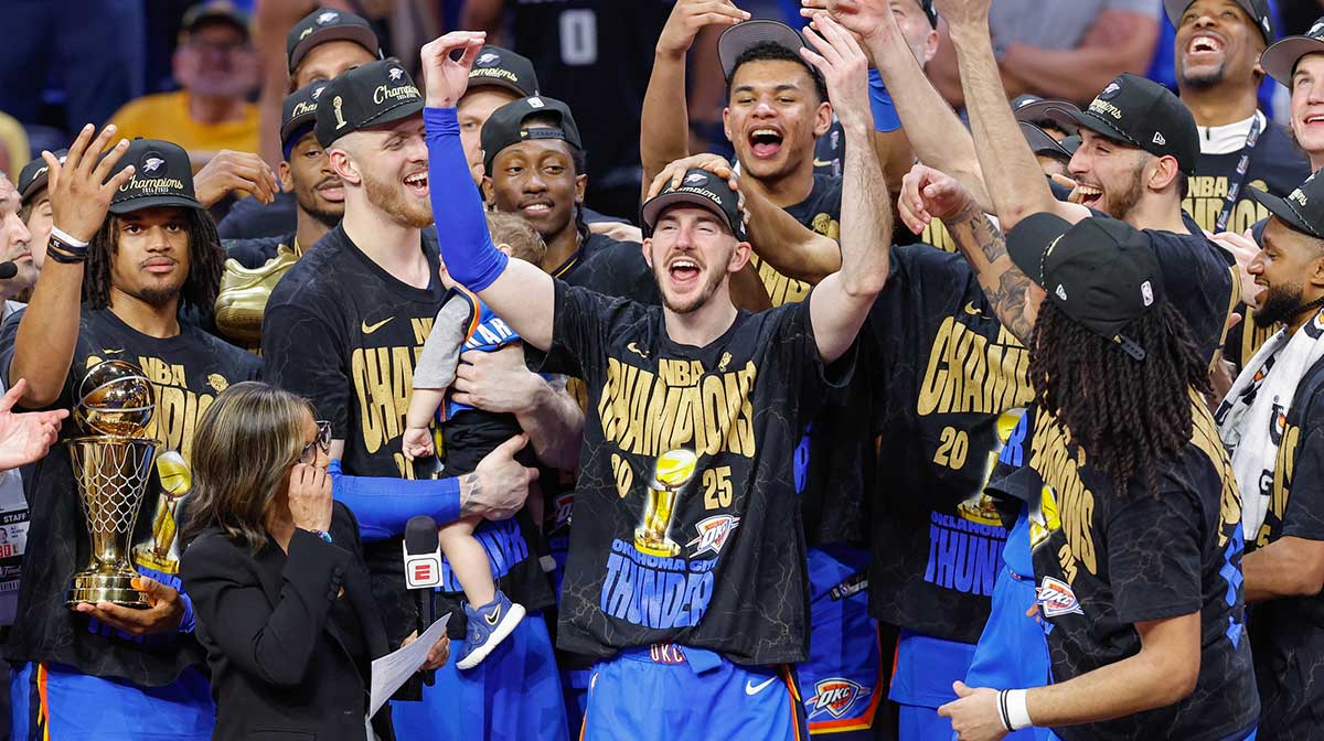 Oklahoma City Thunder guard Alex Caruso (9) during the NBA Championship trophy presentation after game seven of the 2025 NBA Finals against the Indiana Pacers at Paycom Center.