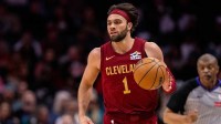 Cleveland Cavaliers guard Max Strus (1) brings the ball up court against the Charlotte Hornets during the third quarter at Spectrum Center.