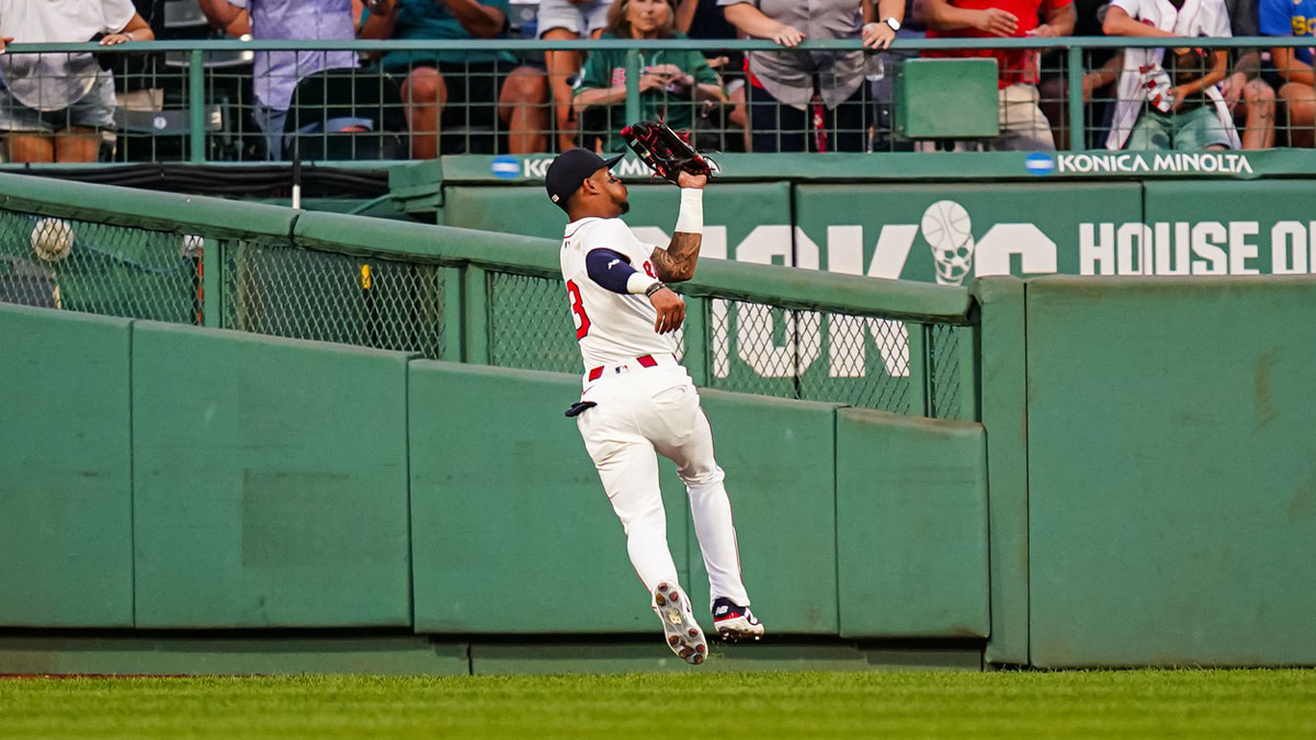 Boston Red Sox outfielder Ceddanne Rafaela (3) makes the out against the Colorado Rockies in the fourth inning at Fenway Park.