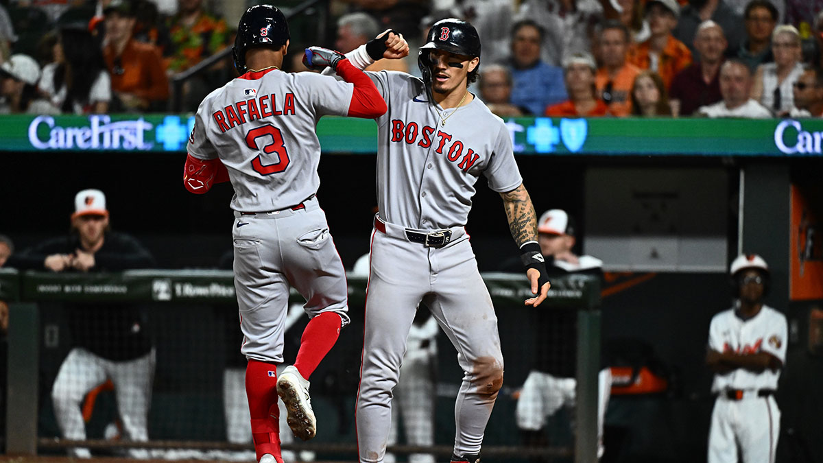 Aug 27, 2025; Baltimore, Maryland, USA; Boston Red Sox outfielder Ceddanne Rafaela (3) celebrates with outfielder Jarren Duran (16) after hitting a two run home run during the ninth inning against the Baltimore Orioles at Oriole Park at Camden Yards.