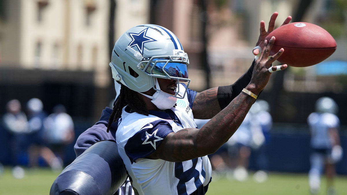 Dallas Cowboys receiver CeeDee Lamb (88) catches the ball at training camp at the River Ridge Fields.