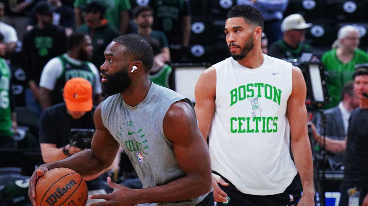 Celtics guard Jaylen Brown (7) and forward Jayson Tatum (0) warm up before game five of first round for the 2025 NBA Playoffs against the Orlando Magic at TD Garden