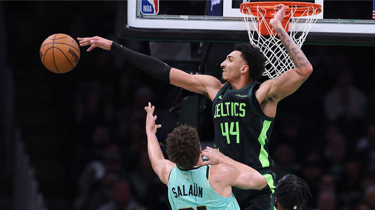 Boston Celtics forward Miles Norris (44) blocks Charlotte Hornets forward Tidjane Salaun (31) during the first half at TD Garden. Celtics waive Miles Norris to open a two-way slot for Amari Williams, balancing roster flexibility and future potential with veteran RJ Luis and Max Shulga.