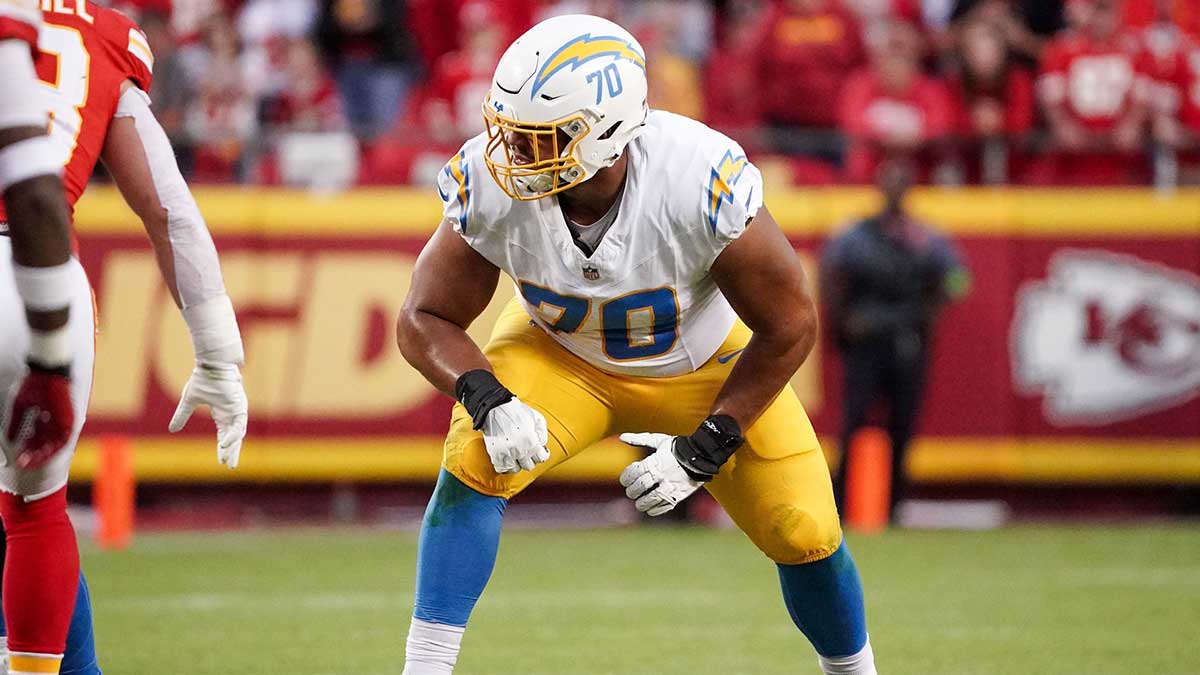 Los Angeles Chargers offensive tackle Rashawn Slater (70) lines up against the Kansas City Chiefs during the game at GEHA Field at Arrowhead Stadium.