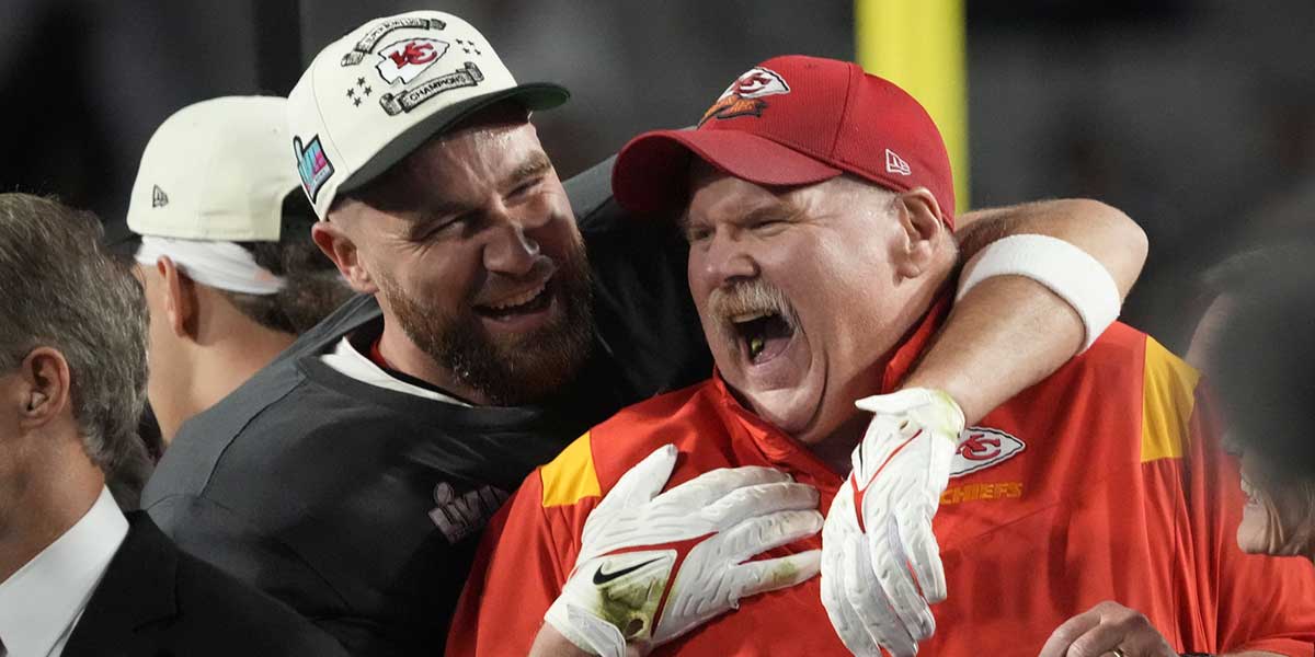Kansas City Chiefs head coach Andy Reid and tight end Travis Kelce celebrate after defeating the Philadelphia Eagles in Super Bowl LVII at State Farm Stadium