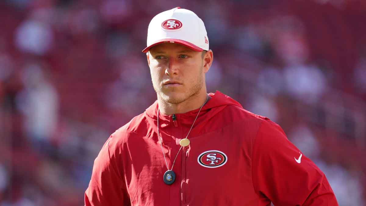 San Francisco 49ers running back Christian McCaffrey (23) watches warm ups before the game against the Denver Broncos at Levi's Stadium.