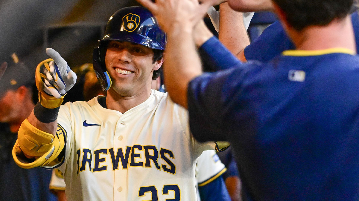 Milwaukee Brewers designated hitter Christian Yelich (22) celebrates after hitting a solo home run in the third inning against the Pittsburgh Pirates at American Family Field.