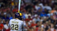 Milwaukee Brewers designated hitter Christian Yelich (22) at bat in the sixth inning against the Cincinnati Reds at Great American Ball Park.
