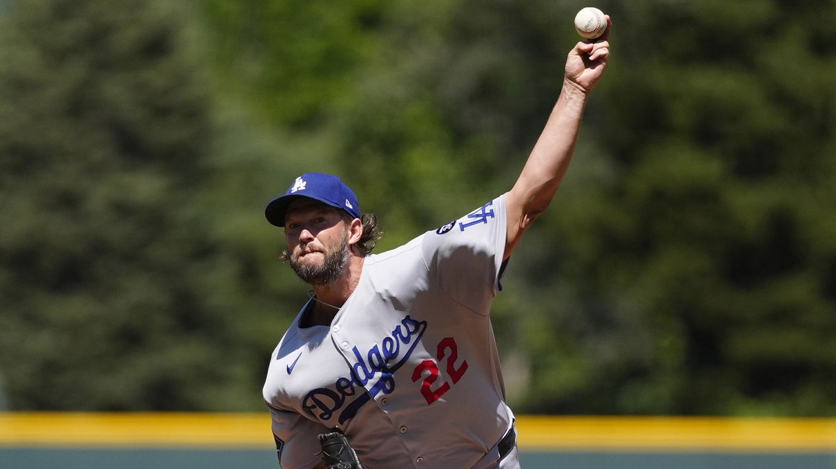 Los Angeles Dodgers starting pitcher Clayton Kershaw (22) delivers a pitch in the first inning against the Colorado Rockies at Coors Field.