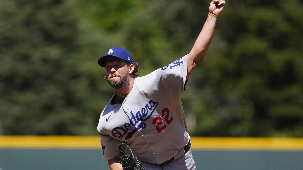 Los Angeles Dodgers starting pitcher Clayton Kershaw (22) delivers a pitch in the first inning against the Colorado Rockies at Coors Field.