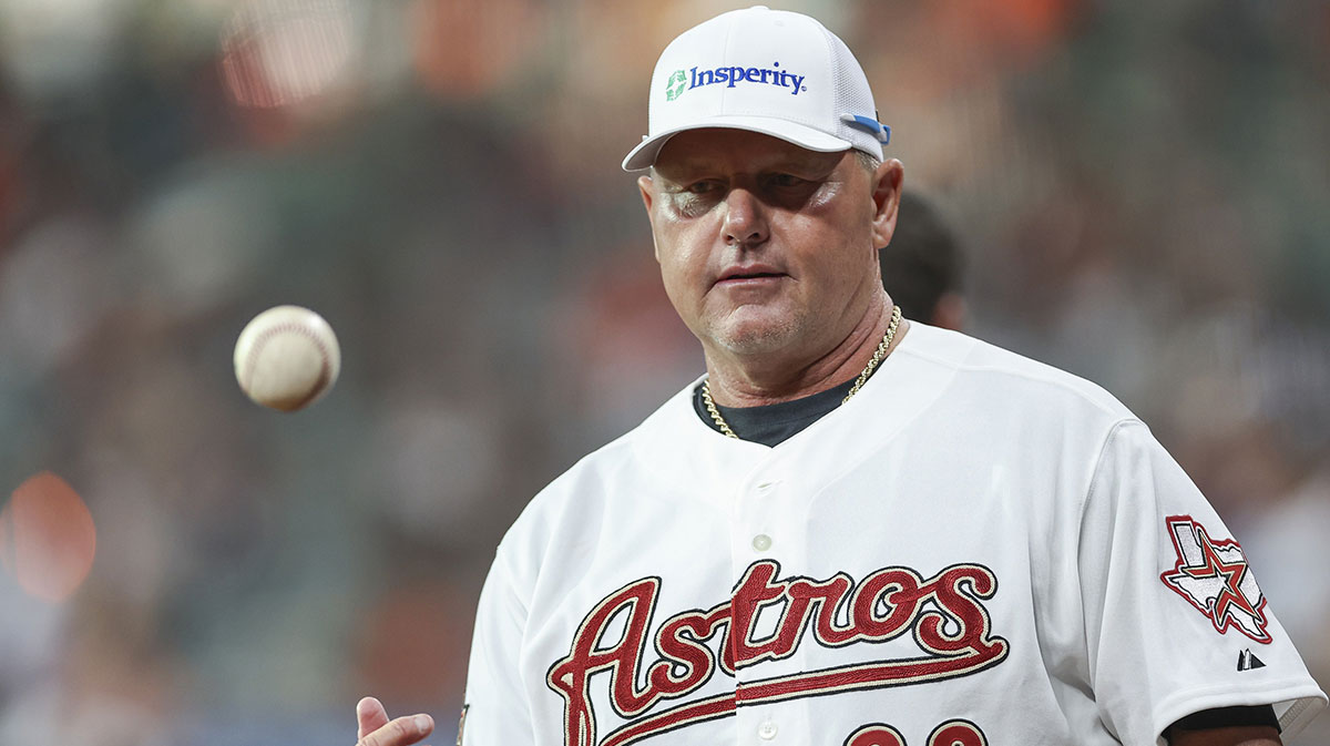 Houston Astros former pitcher Roger Clemens tosses a ball before the game between the Astros and the Tampa Bay Rays at Minute Maid Park.