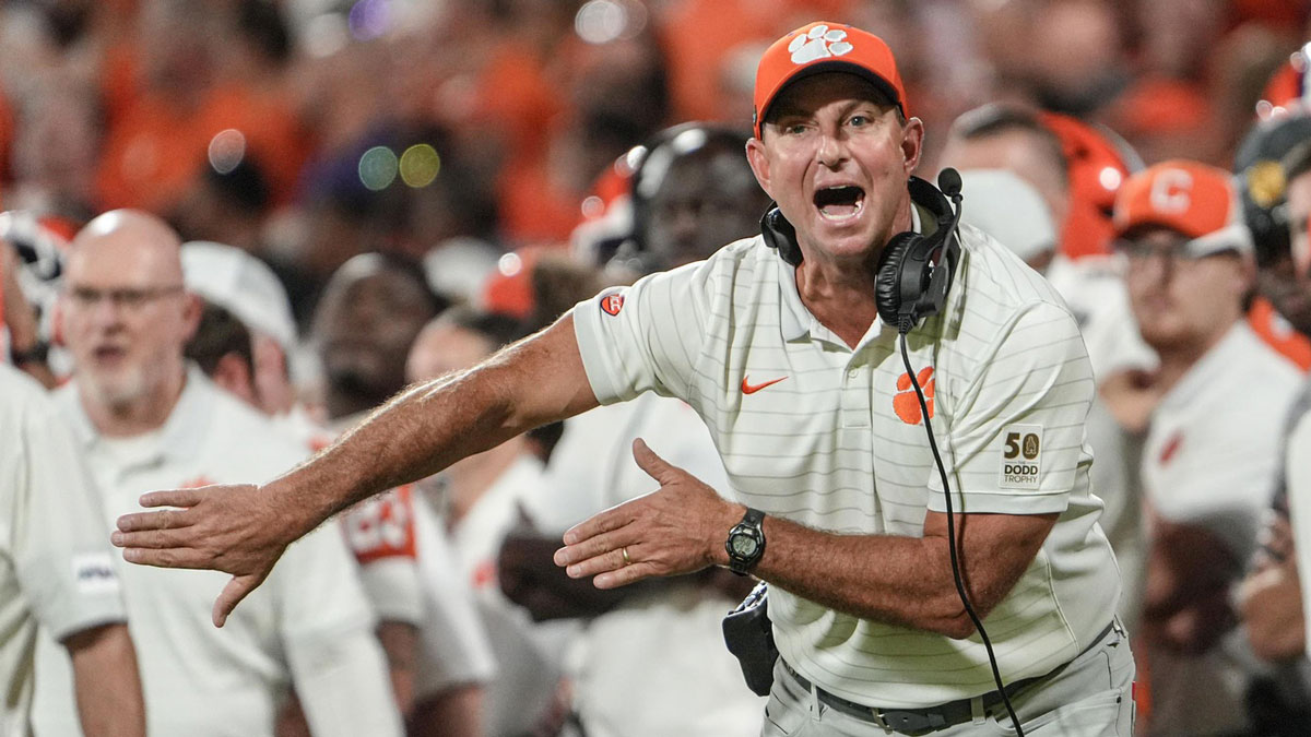 Clemson head coach Dabo Swinney communicates with a referee in the game with Louisiana State University during the second quarter at Memorial Stadium in Clemson, S.C. Saturday, Aug 30, 2025.