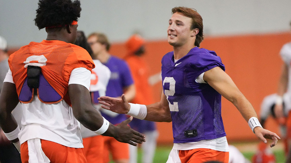 Clemson running back Adam Randall (8) greets quarterback Cade Klubnik (2) during Clemson football 2025 practice at the Allen N. Reeves Football Complex in Clemson, S.C. Friday, August 1, 2025.