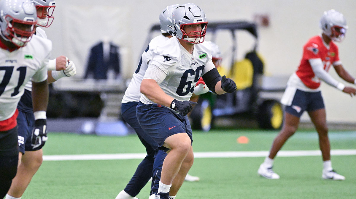New England Patriots guard Cole Strange (69) works on a blocking drill during minicamp held in the WIN Field House at Gillette Stadium. 