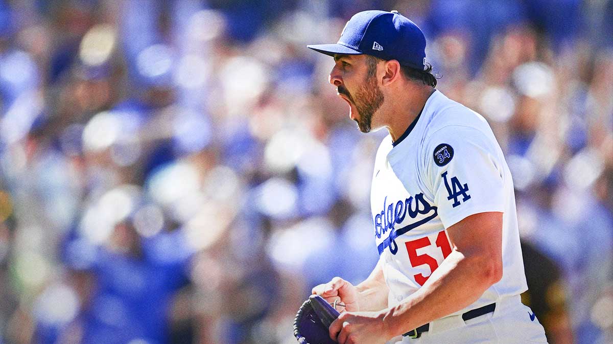 Los Angeles Dodgers pitcher Alex Vesia (51) reacts after pitching a strike out to defeat the San Diego Padres during the ninth inning at Dodger Stadium. Mandatory Credit: Jonathan Hui-Imagn Images
