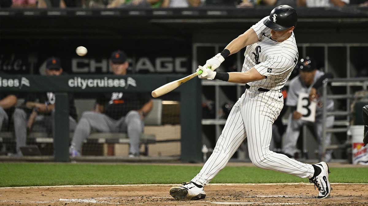 Chicago White Sox shortstop Colson Montgomery (12) hits a home run during the fifth inning against the Detroit Tigers at Rate Field
