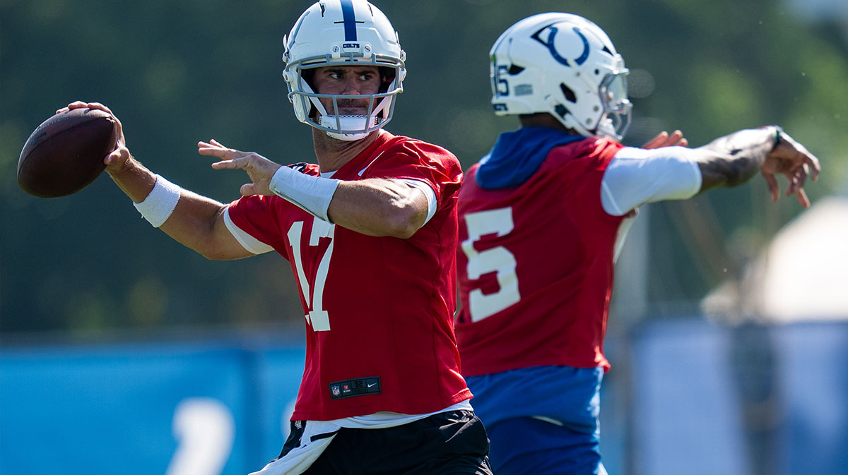 Indianapolis Colts quarterbacks Anthony Richardson Sr. (5) and Daniel Jones (17) pass Wednesday, July 23, 2025, during the first day of training camp held at Grand Park in Westfield.