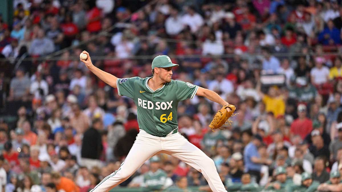 Boston Red Sox starting pitcher Cooper Criswell (64) pitches against the Houston Astros during the fourth inning at Fenway Park.