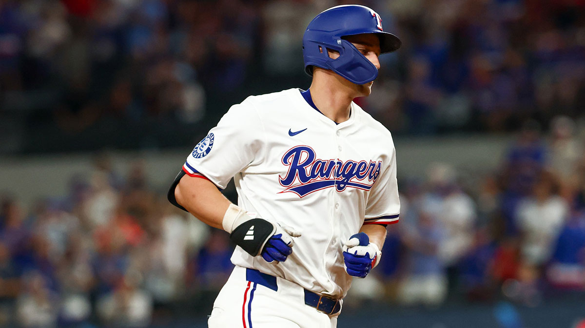Texas Rangers shortstop Corey Seager (5) rounds the bases after hitting a home run during the seventh inning against the Los Angeles Angels at Globe Life Field.