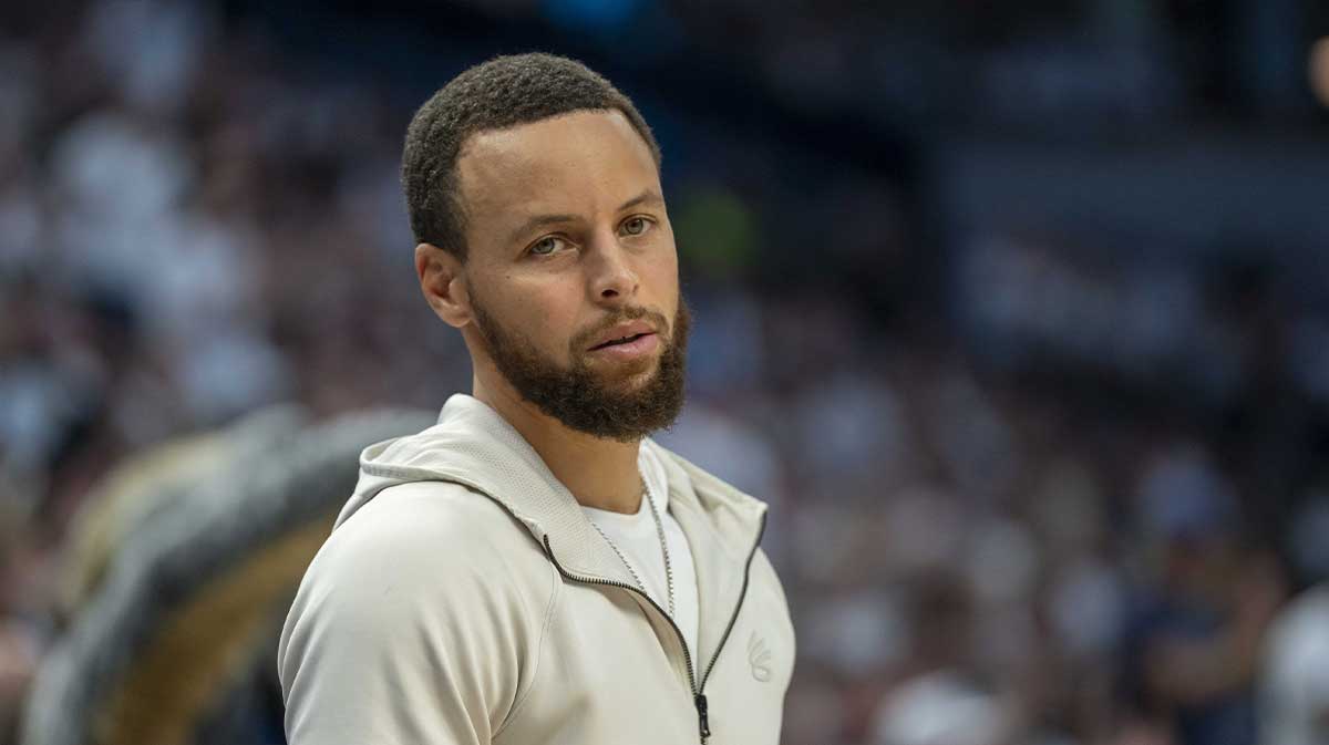 Golden State Warriors guard Stephen Curry (30) looks on against the Minnesota Timberwolves in the second half during game five of the second round for the 2025 NBA Playoffs at Target Center.