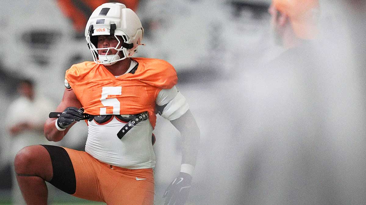 Tennessee defensive lineman Daevin Hobbs (5) warms up during Tennessee football preseason practice, in Knoxville, Tennessee, Aug. 5, 2025.
