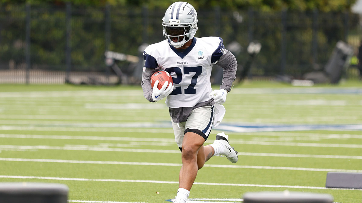 Dallas Cowboys running back Miles Sanders (27) goes through a drill during practice at the Ford Center at the Star Training Facility in Frisco, Texas.