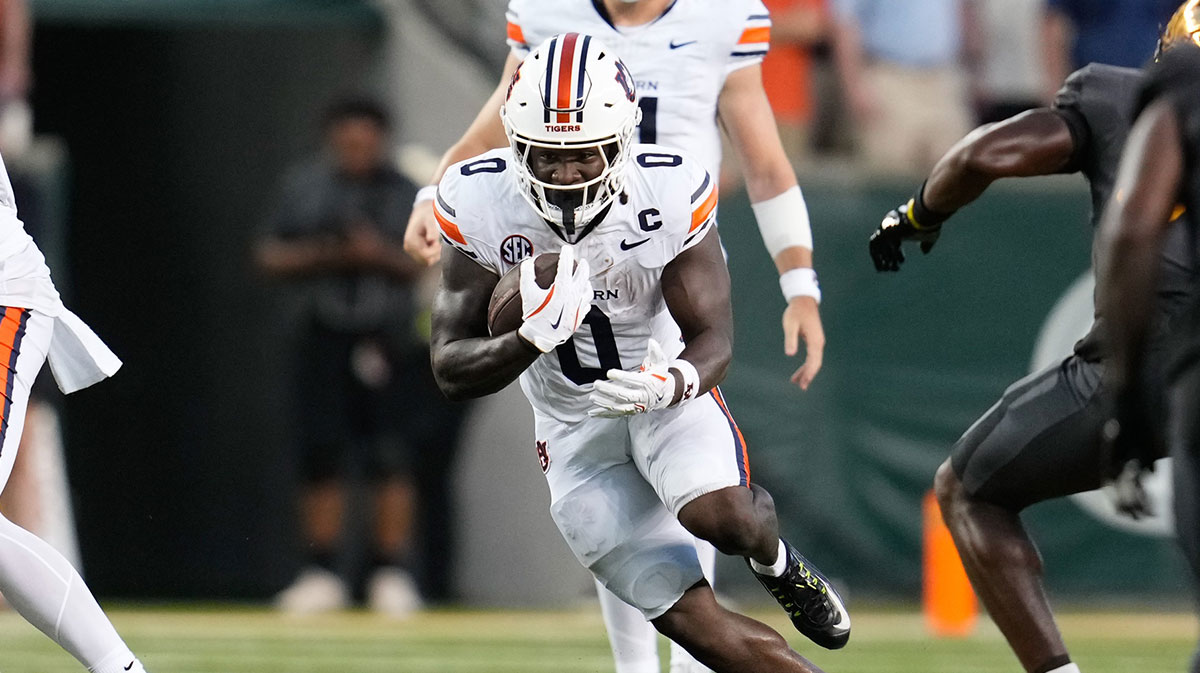 Auburn Tigers running back Damari Alston (0) runs the ball against the Baylor Bears during the first half at McLane Stadium.