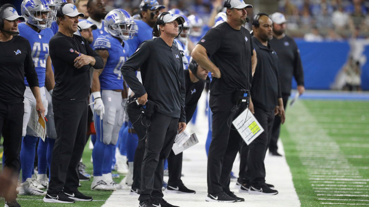 Lions offensive coordinator Ben Johnson, left, and head coach Dan Campbell on the sidelines during the second half of the Lions' 27-23 preseason loss to the Falcons