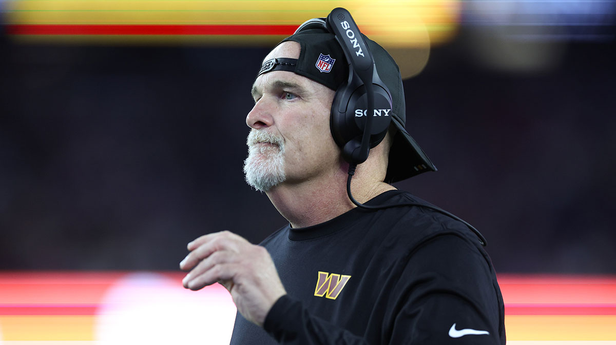Washington Commanders head coach Dan Quinn reacts during the first half against the New England Patriots at Gillette Stadium.