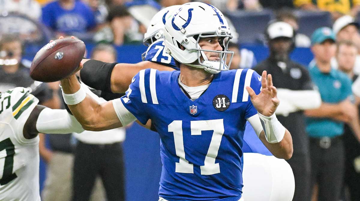 Indianapolis Colts quarterback Daniel Jones (17) throws a pass during the first half against the Green Bay Packers at Lucas Oil Stadium.